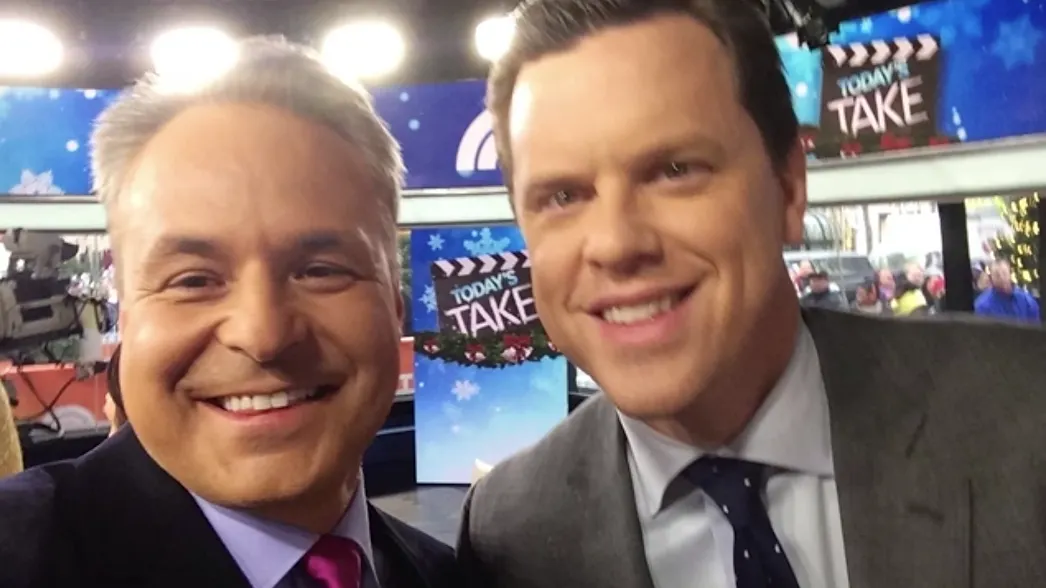 TV hosts taking selfie