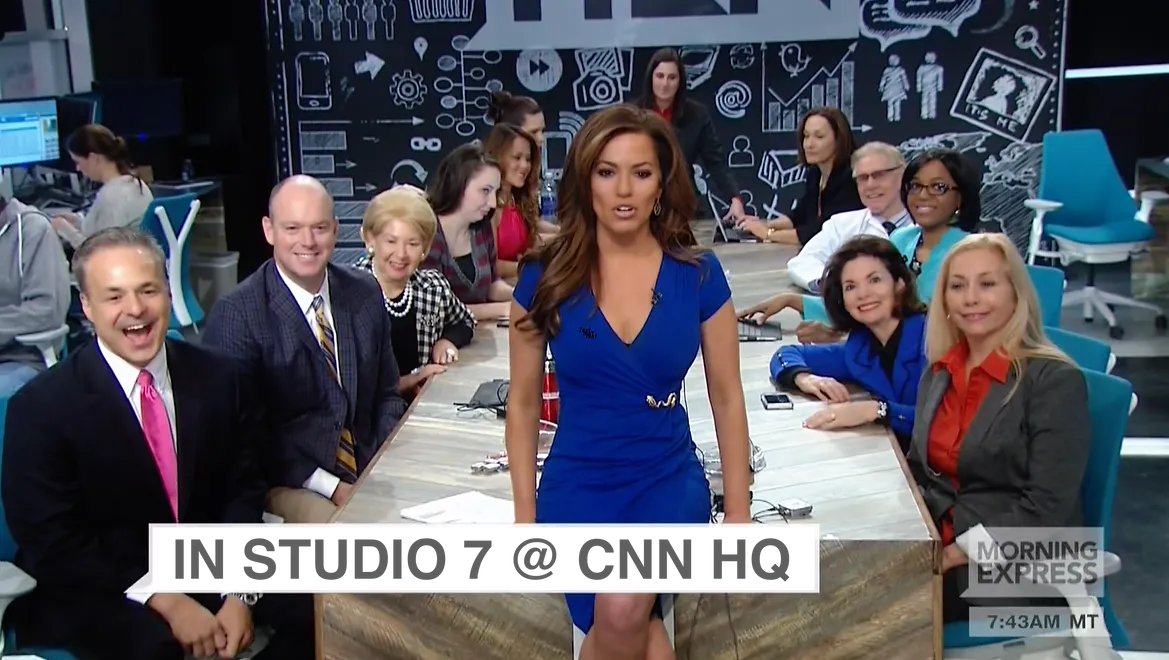 News team gathered in studio