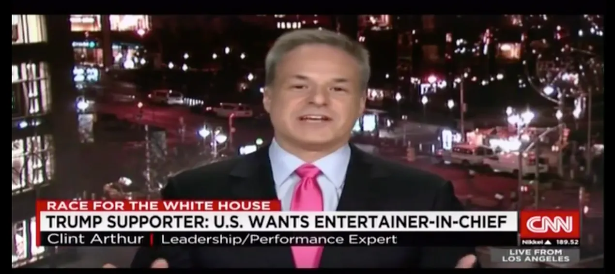 CNN interview with city lights background