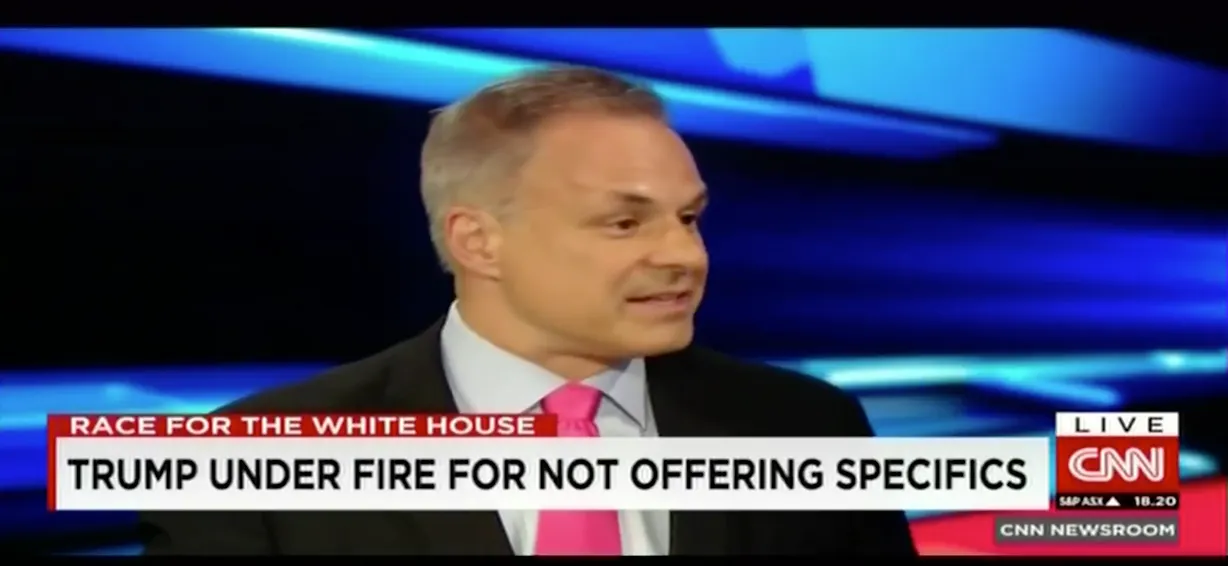 News anchor discussing Trump's campaign specifics