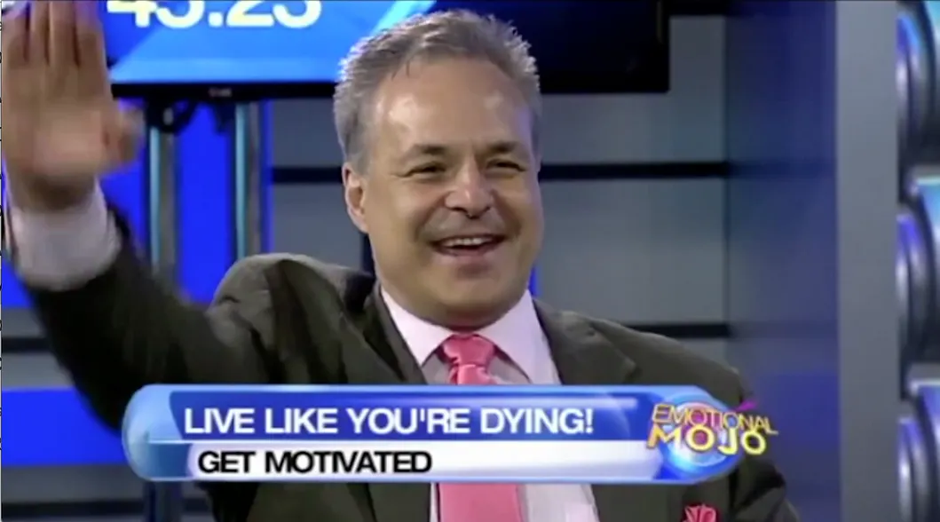 Man smiling on TV show set