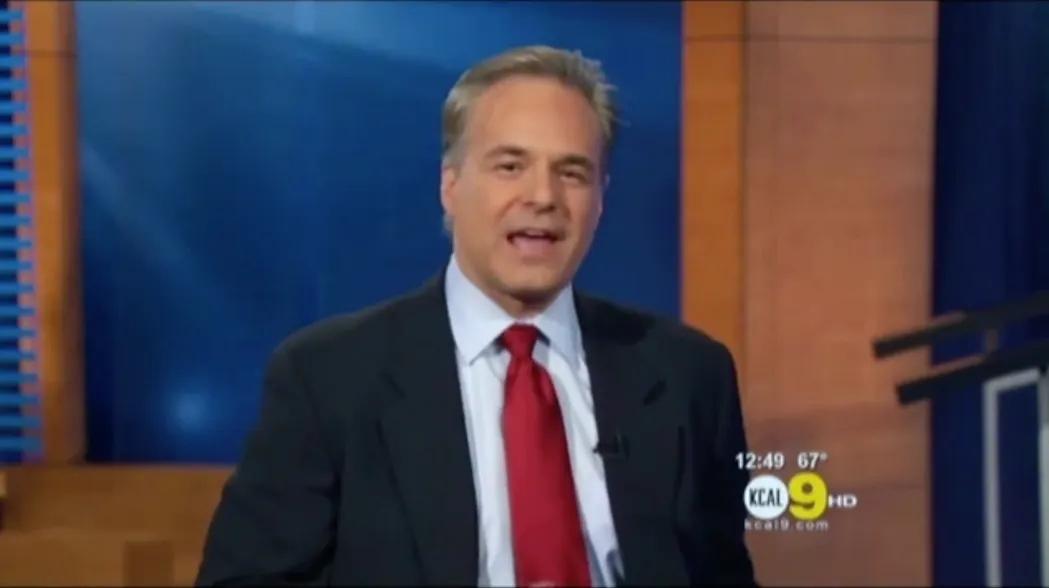 News anchor on TV set