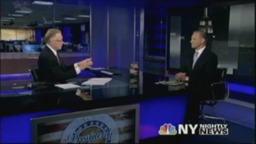 TV interview in studio setting