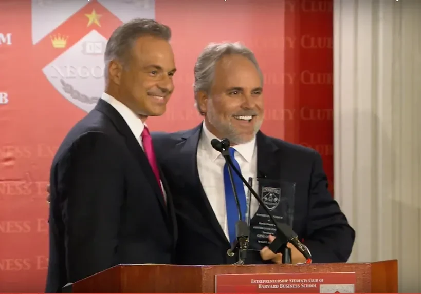 Business event with two men on stage